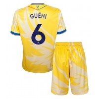 Camisa de Futebol Crystal Palace Marc Guehi #6 Equipamento Secundário Infantil 2024-25 Manga Curta (+ Calças curtas)